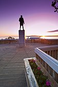 View of Captain James Cook tatue at sunset, Anchorage, Southcentral Alaska, Summer