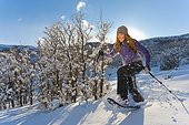 Woman snowshoeing at Park City, Utah, Winter