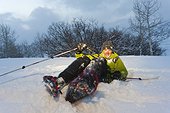 Man falls while snowshoeing, Park City, Utah, Winter