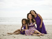 USA, California, Los Angeles, Portrait of mother with daughters (6-11) on beach