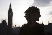 UK, London, Mid adult woman smiling, Big Ben in background