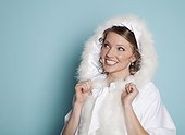 Portrait of happy bride wearing fur hood