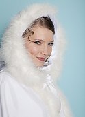 Portrait of happy bride wearing fur hood