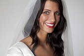 Studio shot of bride smiling