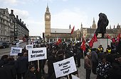 UK, London, Protestors with placards outside Houses of Parliament