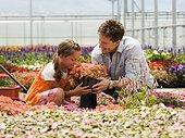 USA,Utah,Salem,Father with daughter (8-9) in greenhouse