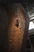 Mid adult man climbing on wall