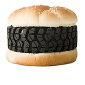 tire in burger as junk food,studio shot