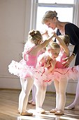 Teacher and girls (2-3,4-5) having ballet class