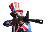 Studio portrait of Uncle Sam using machine gun