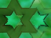 Close-up of star shape pattern on a green background