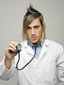 Portrait of a male doctor holding a stethoscope