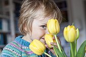 Blond girl with tulips