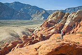 A hiker in the Calico Hills, Red Rock Canyon National Conservation Area, Nevada, USA.