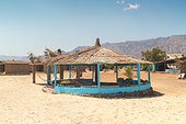Straw huts on beach during daytime, Nuweiba, Southern Sinai, Egypt