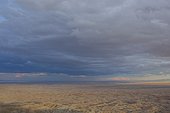 Storm clouds over barren landscape of Anza Borrego State Park badlands, California, USA