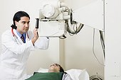 Doctor preparing x-ray machine