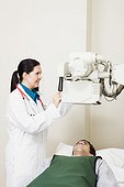 Doctor preparing x-ray machine