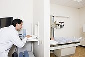 Patient and doctor in x-ray room