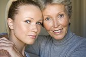 Mature woman with daughter face to face