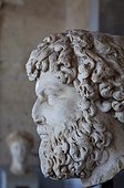 Roman bust at the Stoa of Attalos. the Roman bust of a man with a beard at the Stoa of Attalos in Ancient Agora