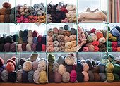 Knitting wools on shelves