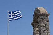 Greek flag at Palamidi fortress. a Greek flag flying near a bell tower at Palamidi fortress