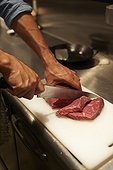 Slicing steak with a knife