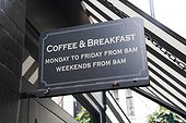 Coffee and breafast sign outside restaurant
