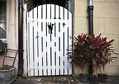 Whimsical garden gate in Savannah's Historic District.