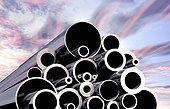 Stack of various steel pipes against the sky, 3d Illustration
