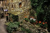 The courtyard of an historic stone building, a family home, in a small village in Tuscany