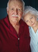 portrait of a mature couple standing close together