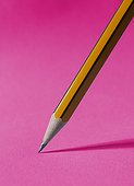 Sharp pencil om as pink background