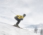 Skier gaining momentum on slope