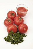 Tomatoes with tomato juice and parsley