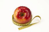 Apple with measuring tape