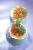Boiled egg with salmon caviar
