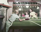 Family playing table tennis