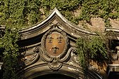 Rome, Italy.. A crest above a doorway.