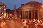 Rome, Italy.. Tourists blur in the twilight in front of the Pantheon.