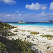 Italy ITA/Sardinia, Stintino View of the beach with the Isola Piana Tower and Asinara Island in the background