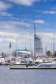Germany, Bremen, Bremerhaven, Sail City building, altter hafen and skyline of Havenwelten-district