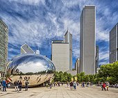 United States, Illinois, Chicago, Downtown, Loop, Millennium Park, AT&T Plaza, the Cloud Gate sculpture (popularly knows ad The Bean) by Anish Kapoor / ADAGP and some skyscrapers of the town