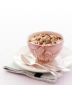 Cereal in pink bowl with butterfly carving