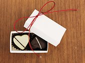 Heart-shaped chocolate in small gift box
