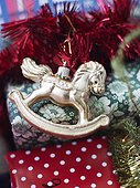 Rocking horse shaped christmas bauble and gifts