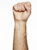 Fist of man against white background