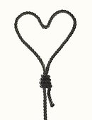 Heart shaped noose against white background