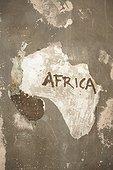Africa-shaped peeling paint pattern on wall